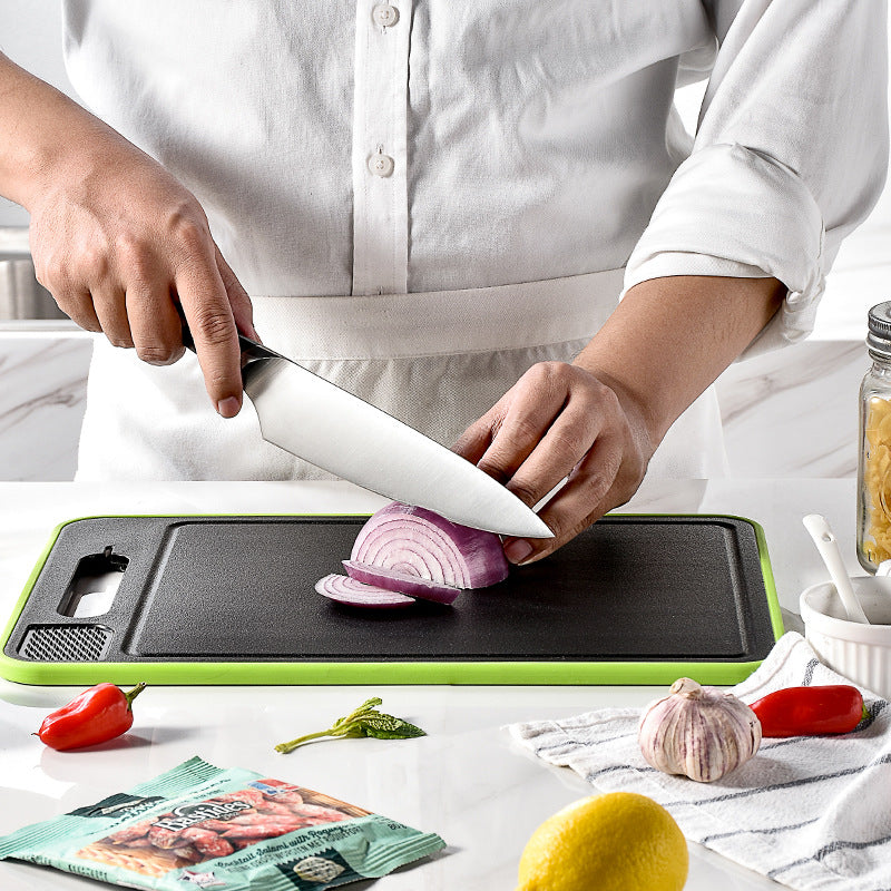Defrosting Cutting Board  with Knife Sharpener in use